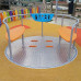 Carrousel pour aire de jeux accessible en fauteuil roulant