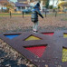 Trampoline à enterrer de forme triangulaire pour aire de jeux